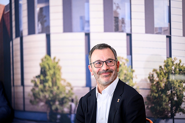 Steven S. Wymer Seated and Smiling at Groundbreaking Ceremony